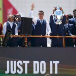 Portugals-winning-EURO-2016-team-ride-in-open-bus-with-Cup-on-return-to-Lisbon