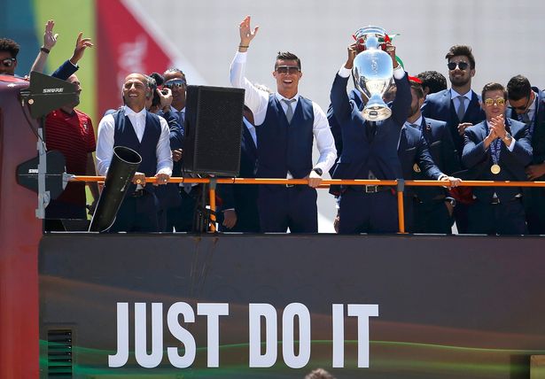 Portugals winning EURO  team ride in open bus with Cup on return to Lisbon