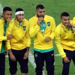 brazil football team with olympic medal