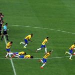 brazil runs towards neymar