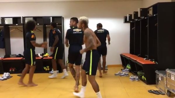 Neymar doing the running man with team mates