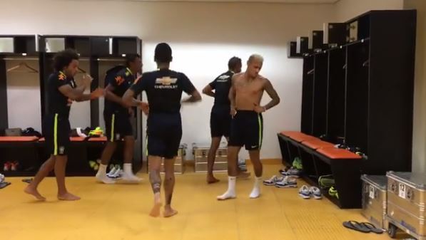 Neymar doing the running man with team mates