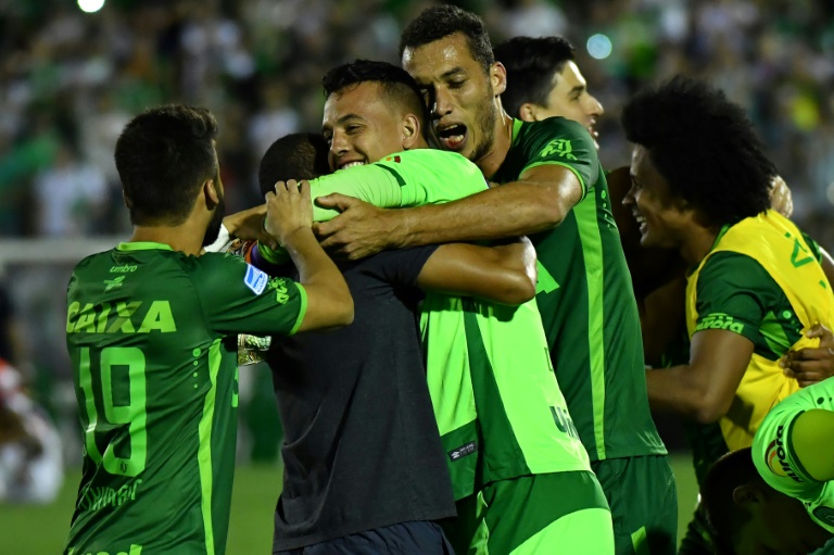 Brazil's Chapecoense footballers celebrate after defeating Argentina's San Lorenzo.