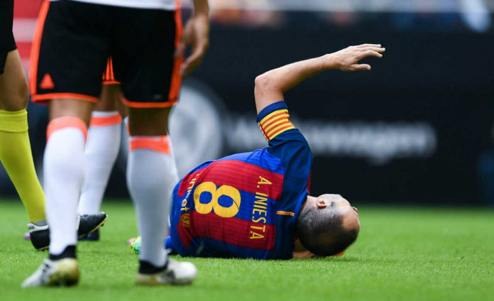 iniesta-knee-brace-2 Andres Iniesta