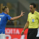 immobile argues with referee