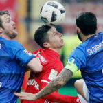 lewandowski fights for the ball