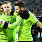 wolfsburg celebrate win over monchengladbach