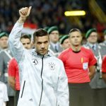 Podolski-gives-the-crowd-a-thumbs-up-before-kick-off