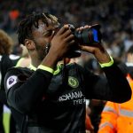Chelseas-Michy-Batshuayi-picks-up-a-photographers-camera-as-he-celebrates-winning-the-Premier-Leagu