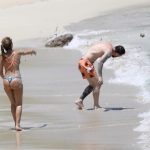 Anotenella also joined in the fun as she stood up and aimed a clump of sand back at Messi.