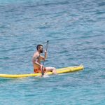 Lionel Messi relaxed on a paddleboard in the Caribbean Sea