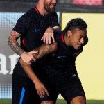 Neymar looked in better spirits alongside Lionel Messi in training