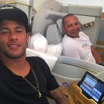 Neymar will travel to Qatar to meet with PSG’s president. He is pictured on a flight here with his father and agent