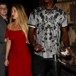 Pogba had a wad of American bills in his left hand but somehow managed to leave the lady looking baffled