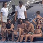 Georgina appears to have a growing tummy around her midriff while in Ibiza