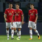 Manchester United’s players look dejected after conceding a second to Real Madrid