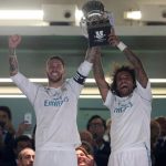 Sergio Ramos and Marcelo hold aloft the trophy as Real Madrid won the Super Cup
