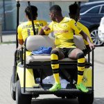 The 20-year-old sits on the back of a buggy while Pierre-Emerick Aubameyang drives