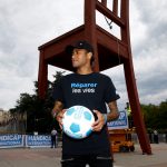 Newly appointed Goodwill Ambassador for Handicap International Neymar poses in front of the UN in Geneva