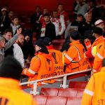 Cologne fans try to taunt Arsenal supporters as security guards battle to keep control
