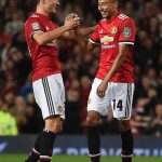 Jesse Lingard is congratulated after putting United out of sight against the Brewers