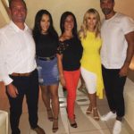 Rio Ferdinand is pictured with his current partner, Towie star Kate Wright and some friends