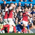 The Arsenal players react in fury after David Luiz went in studs high on Sead Kolasinac