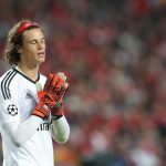 Benfica goalkeeper Mile Svilar shows his disappointment at conceding