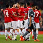 Manchester United celebrating after they reached the Champions League knockout rounds