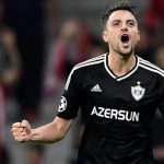 Qarabag’s Michel celebrates after scoring his side’s opening goal during a Group C Champions League soccer match between Atletico Madrid and Qarabag at the Metropolitano stadium in Madrid, Spain.