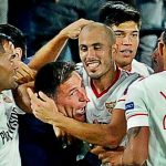 Sevilla players rushed to celebrate their late equaliser with their manager
