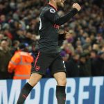 The Germany international celebrates after firing Arsenal ahead