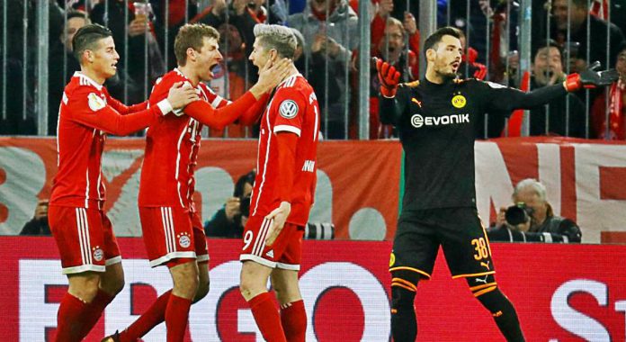 Thomas Muller celebrates after giving Bayern Munich a 2-1 lead in DFP Cup