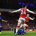 Eden Hazard went down in the area after a challenge from Bellerin