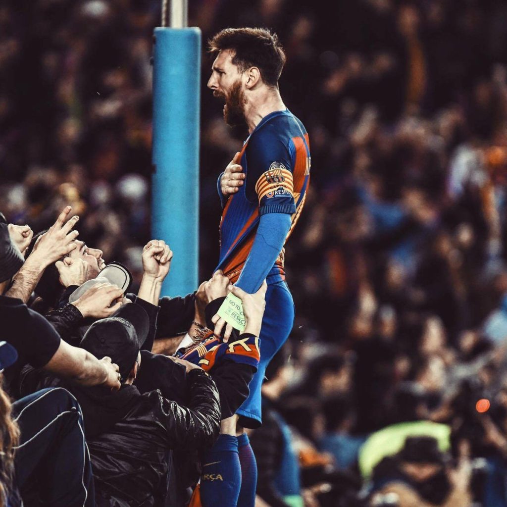 Lionel Messi celebrates their victory at the end of the UEFA Champions League round of 16 second leg football match FC Barcelona vs Paris Saint-Germain FC at the Camp Nou stadium in Barcelona on March 8.