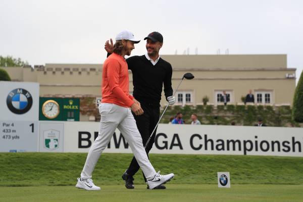 Pep Guardiola playing golf with pro golfer Tommy Fleetwood