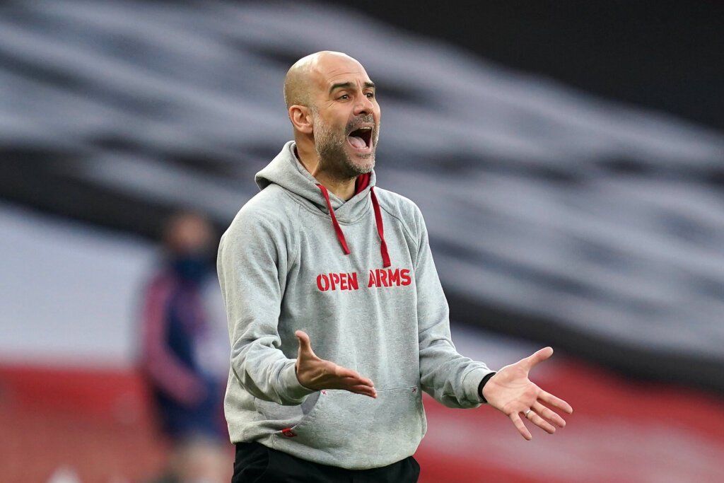 Pep Guardiola in Open Arms hoodie