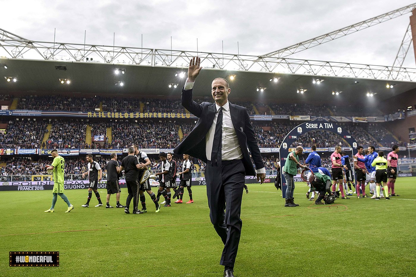 Allegri waves at the fans after winning his fifth Serie A title with Juventus