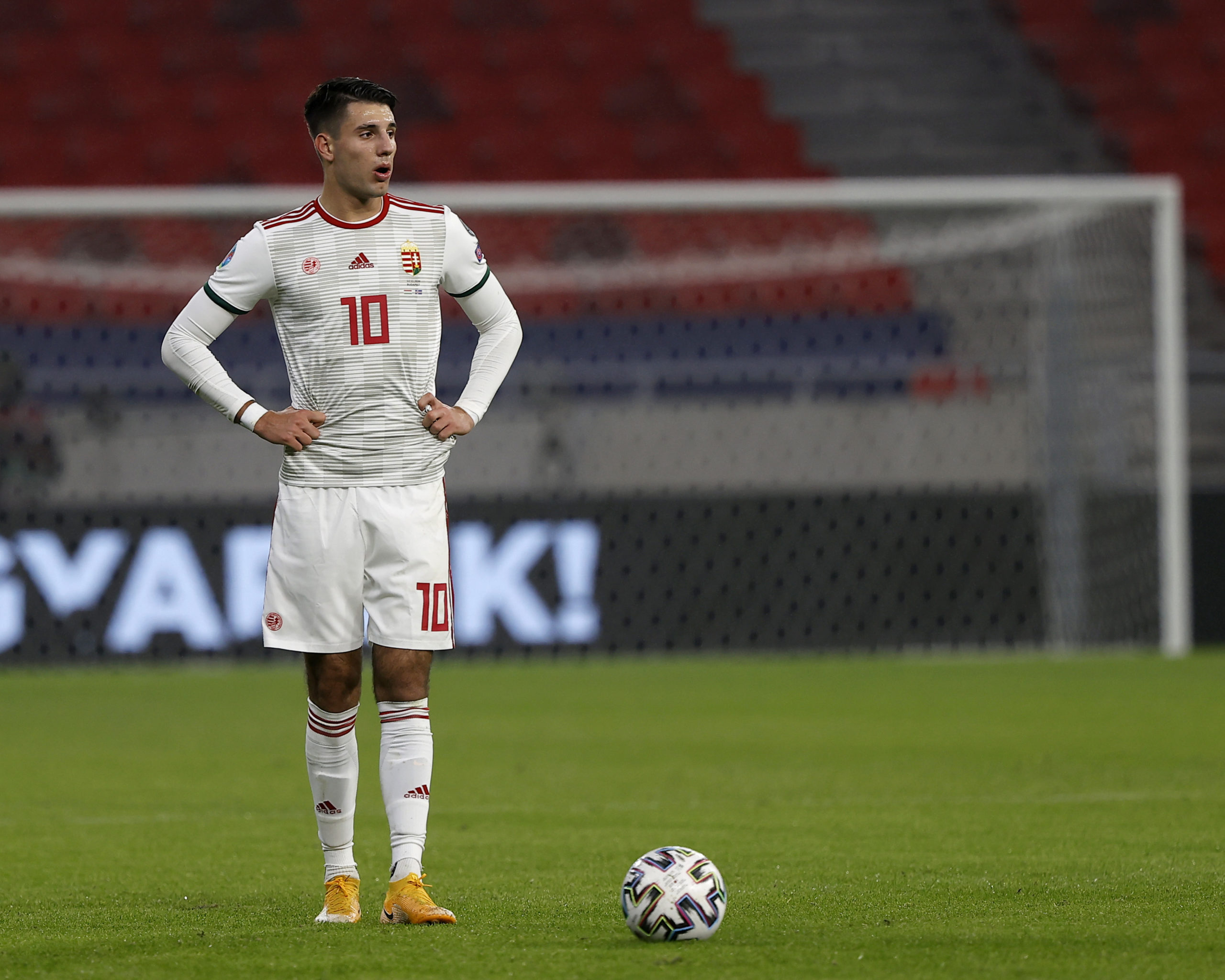 Dominik Szoboszlai stands on the ball as to take a free-kick for Hungary