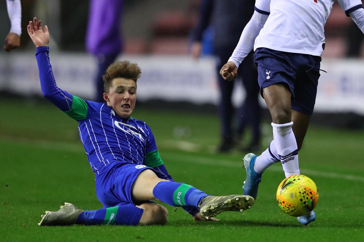 Alfie Devine in action for Wigan U23s against Spurs U23s